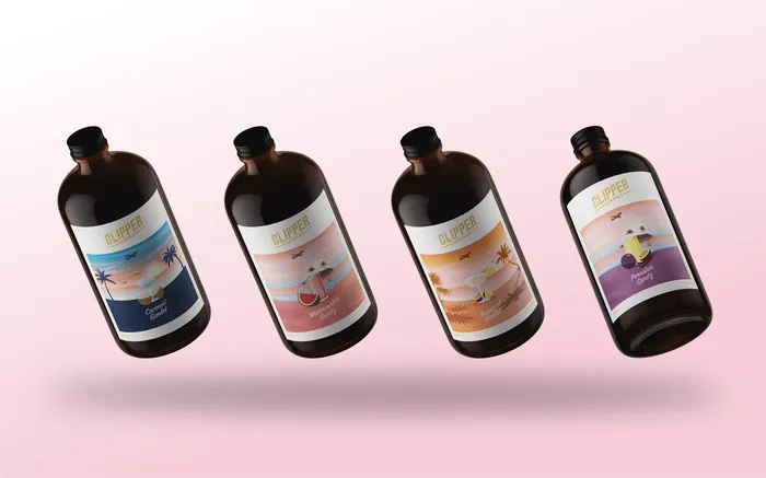 Four brown cocktail bottles with vintage travel poster style labels