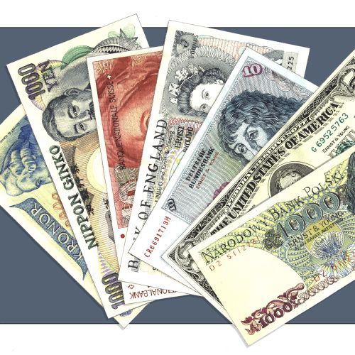 Spoof banknotes featuring famous faces in a fan arrangement by Alan Baker