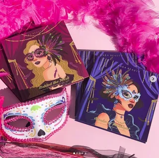 Colorful masquerade mask art prints by Alex Cabal with a decorative mask and pink boa
