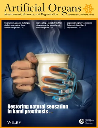 Human hand holding metallic prosthetic hand with steaming mug