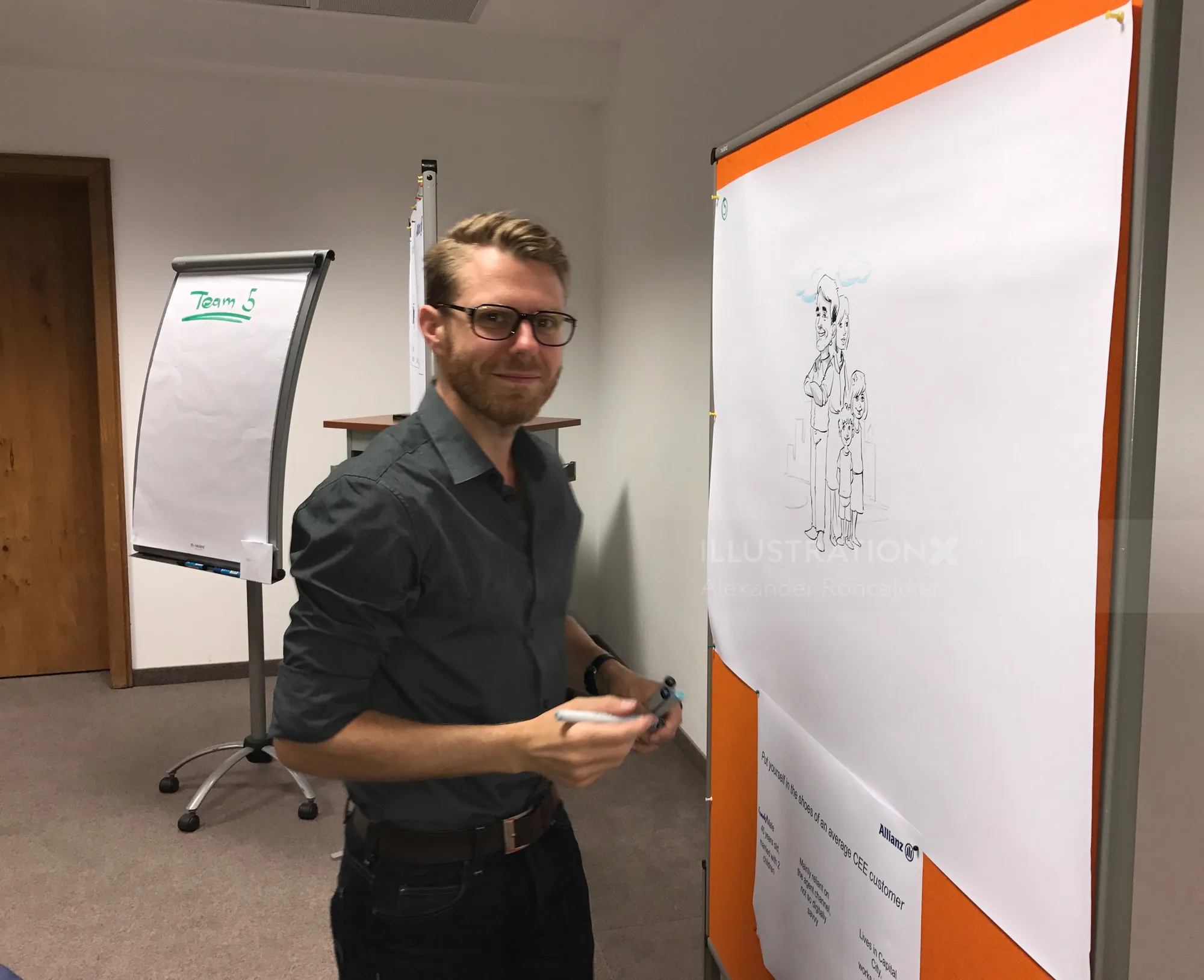 Man drawing detailed sketch on large paper pad Alexander Roncaldier
