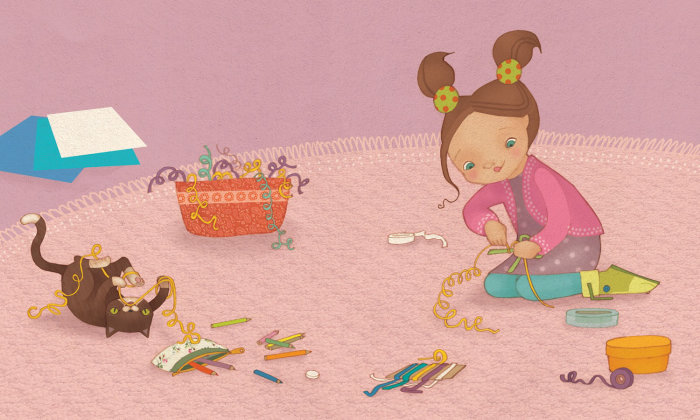 young girl is making some Christmas decorations