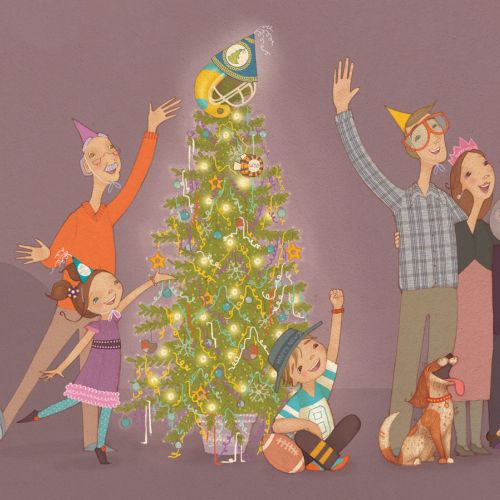 family stand around the christmas tree