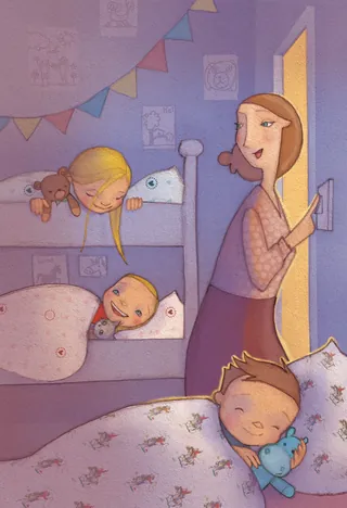 Mother turns off light as three children in pajamas prepare for bed