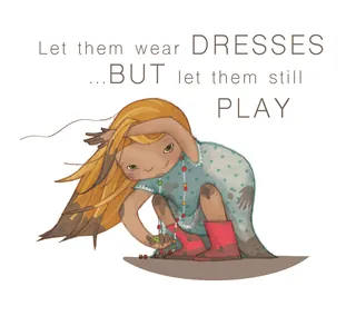 Girl wearing a dress and boots playing outdoors