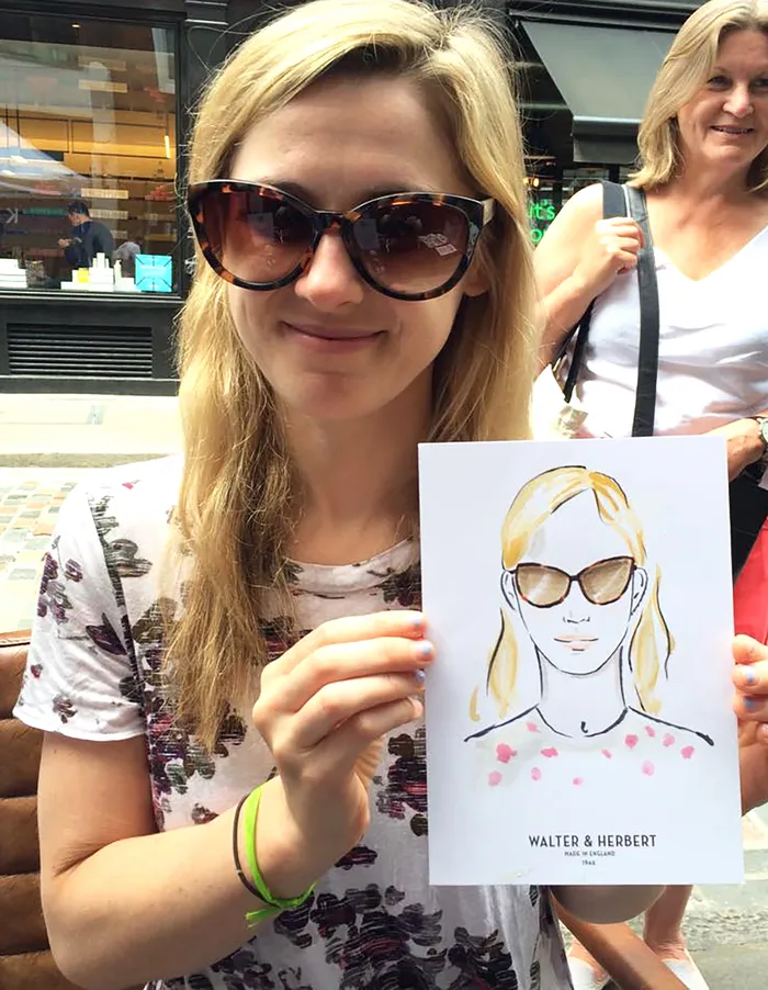 Woman poses with her live portrait