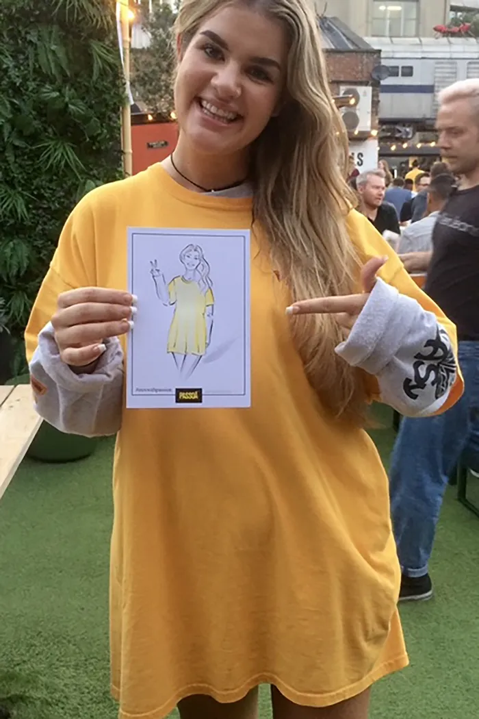 Girl at Passoã drinks party with live illustration
