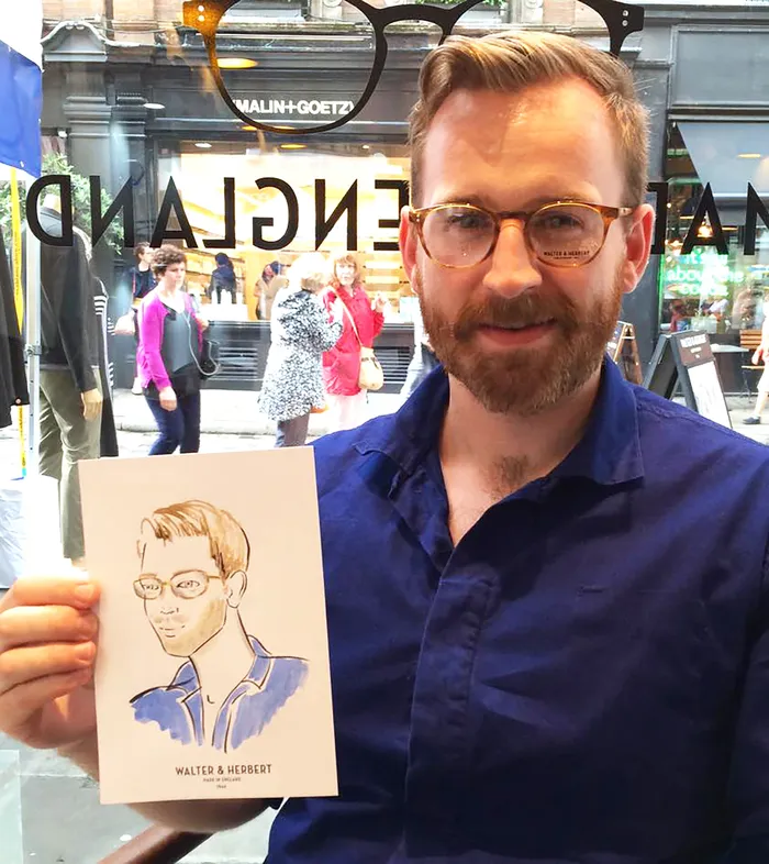 Sophisticated guest with glasses at high-end couture exhibition