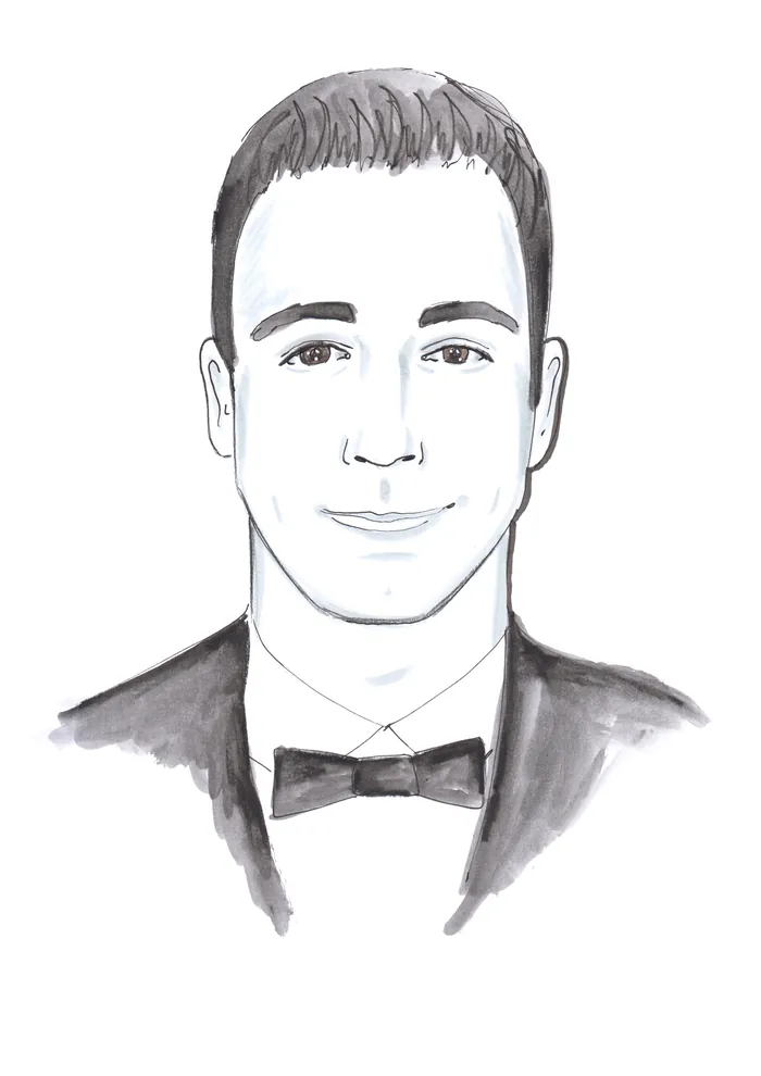 Black and white portrait of a man in a tuxedo with a bow tie