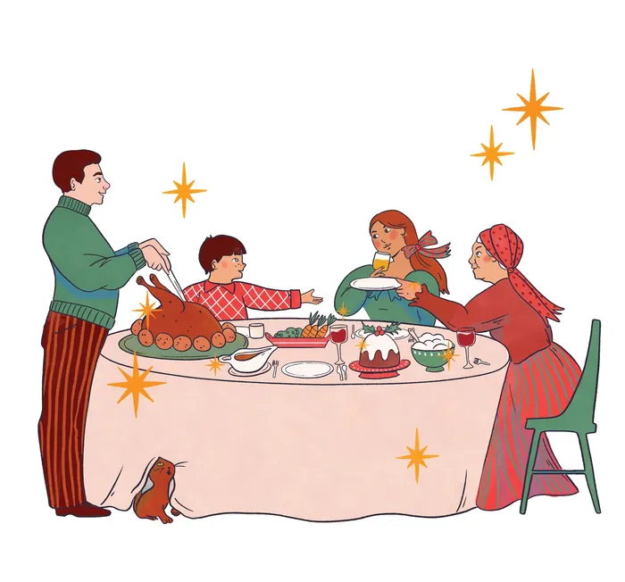 Family sharing holiday meal around table with festive dishes