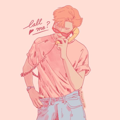 Person with red hair holding a vintage phone with call me text.