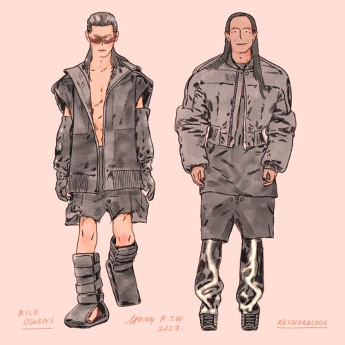 Two fashion models on catwalk wearing oversized gray outfits
