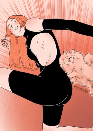 Woman in black outfit stretching with a fluffy cat beside her