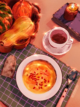 Bowl of pumpkin soup, cup of coffee, pumpkins, and candle on table.