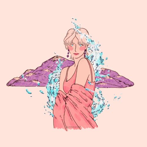 Woman with water splashes and purple mountains behind her