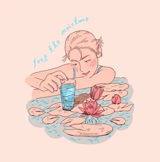 Woman leaning on water surrounded by lotus flowers and a glass of water