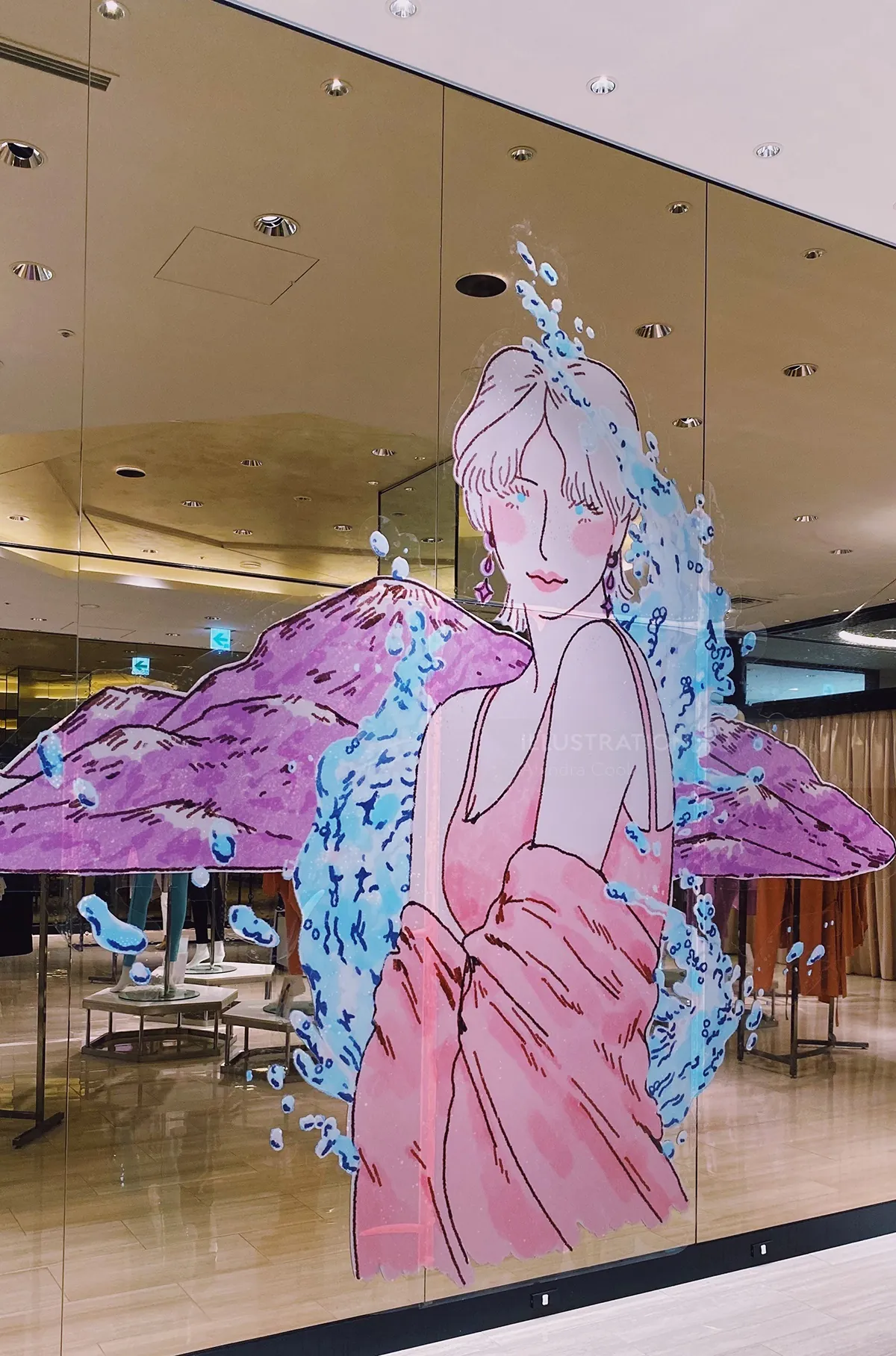 Illustration of a woman with pink wings and blue butterflies by Alxndra Cook