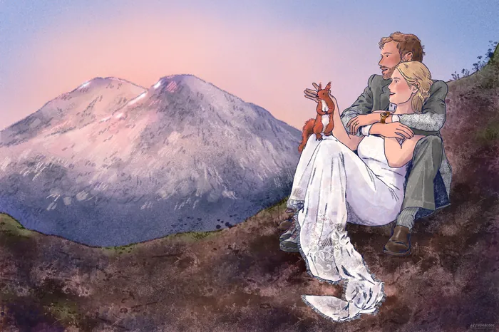 Bride and groom sitting on hilltop near mountains at sunset