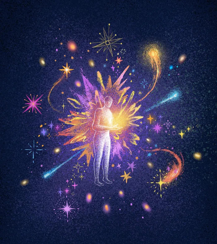 Glowing human silhouette among colorful cosmic stars and light bursts