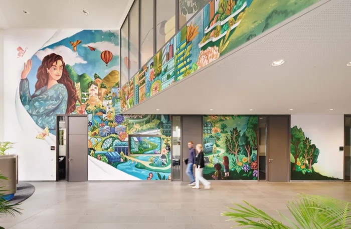 Nature-themed mural with wildlife and balloons by Alyssa De Asis