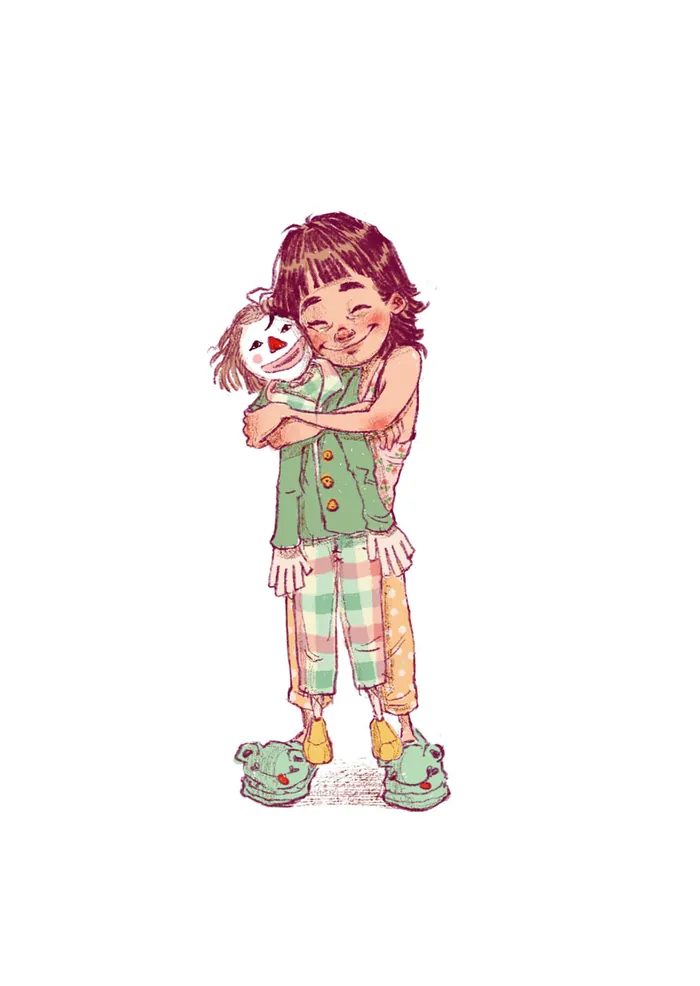 Happy girl hugging scarecrow doll in colorful patchwork clothing