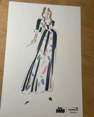 Fashion illustration of woman in long colorful dress with puffed sleeves