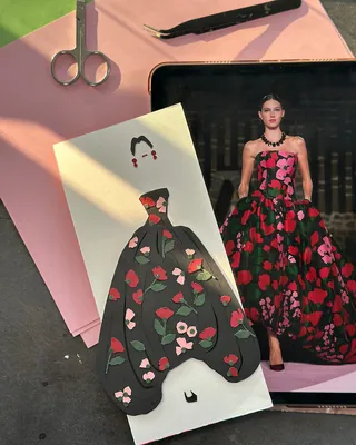 Paper cutout and photo of woman in floral black dress fashion illustration