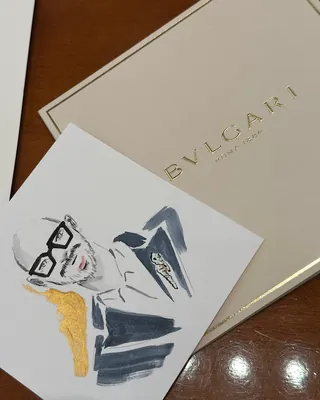 Fashion sketch artist drawing live for BVLGARI store visitors