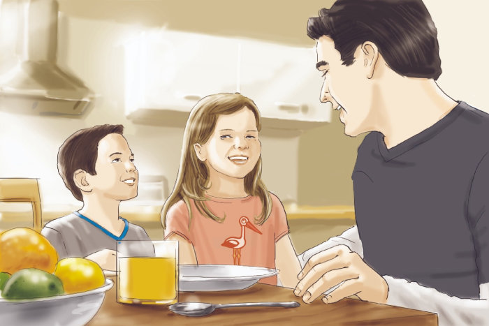 Père enfants à table à manger