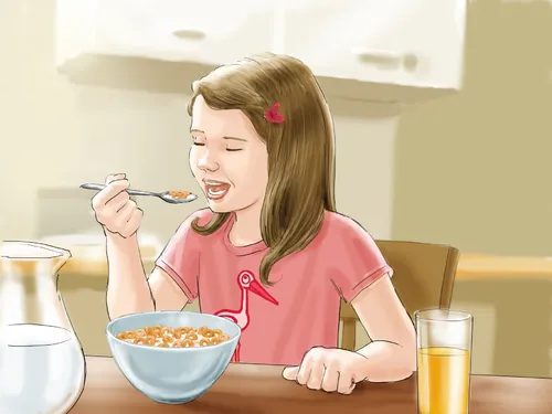 Beautiful girl having breakfast
