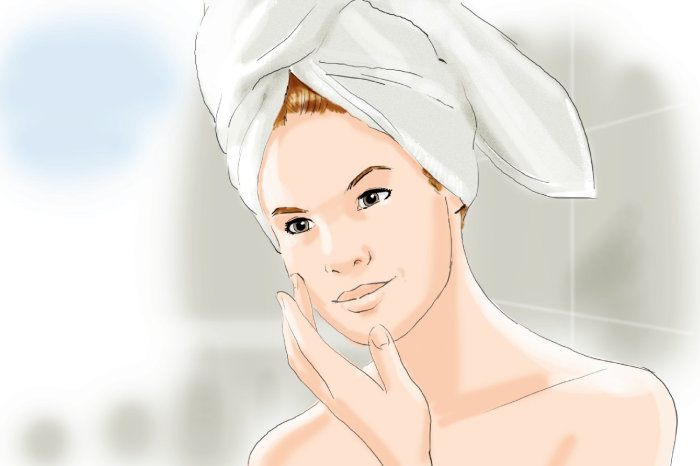 Woman hair wrapped in towel

