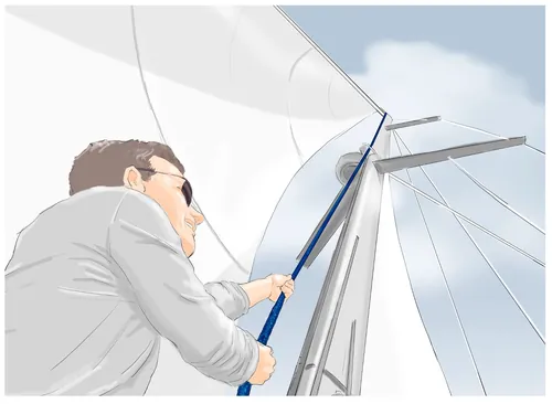 Man adjusting sail on yacht with cloudy sky Andreas Schickert