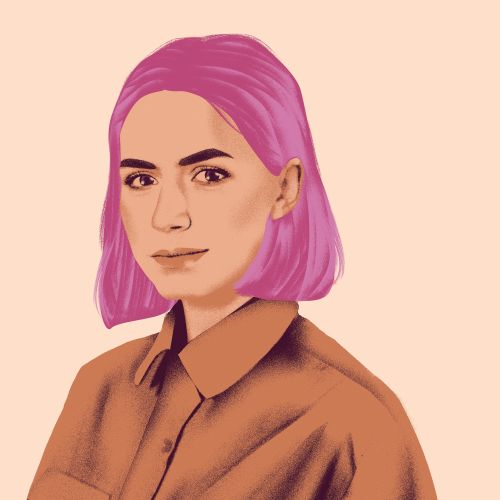 Portrait of woman with pink hair and brown shirt on beige background
