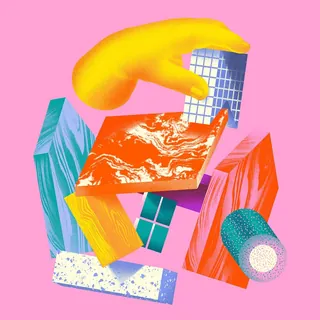 Yellow hand arranging vibrant geometric blocks on pink background