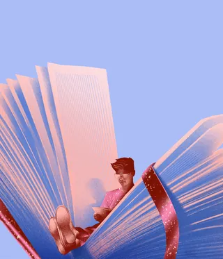 Person sitting and reading inside a large open book with a pink ribbon
