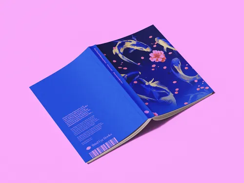 Open book with vibrant koi fish design on cover by Andrei Nicolescu