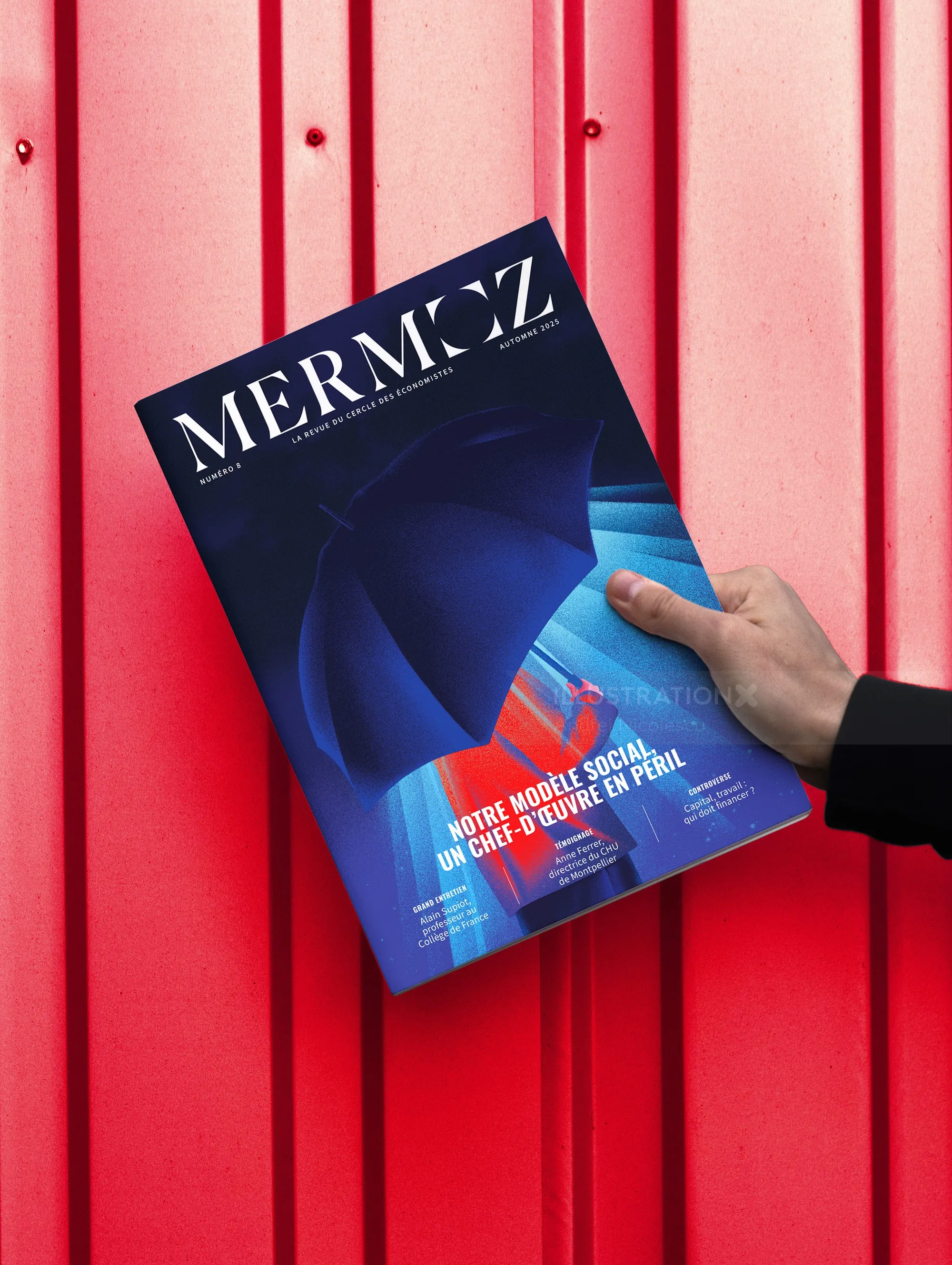 Hand holding Mermoz magazine with abstract blue cover by Andrei Nicolescu