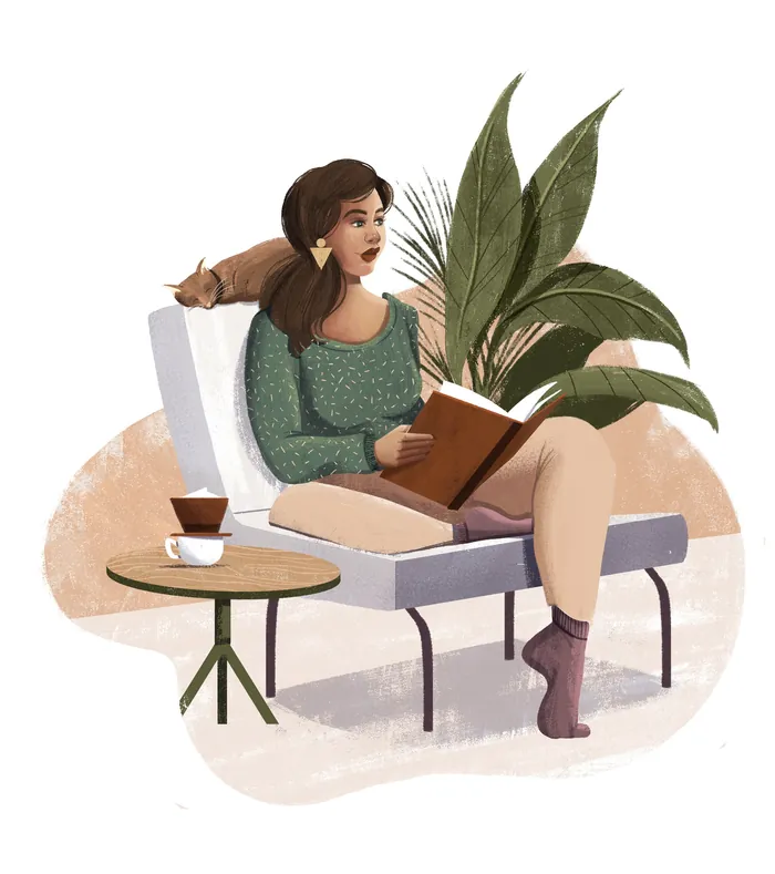 Woman sitting on chair reading a book with coffee and plant by Andressa Meissner
