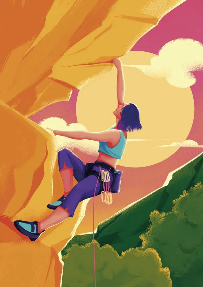 Woman rock climbing at sunset with climbing gear and scenic background