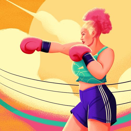 Female boxer with pink hair throwing a punch in the ring