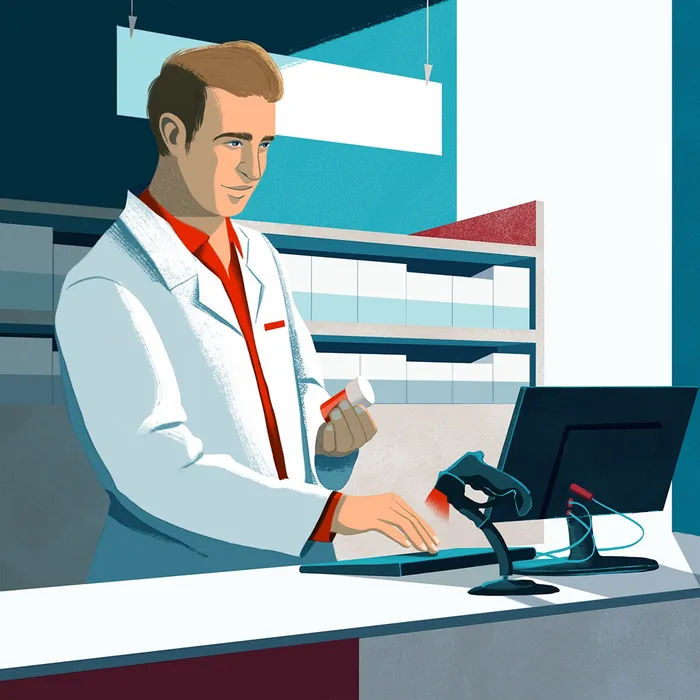 Pharmacist scanning medication at pharmacy counter