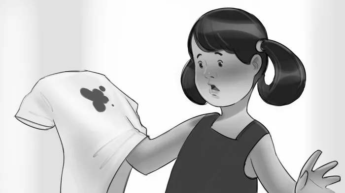 Surprised girl holding a stained white shirt by Andriy Vynogradov