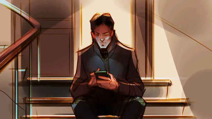 Man sitting on stairs looking at smartphone by Andriy Vynogradov