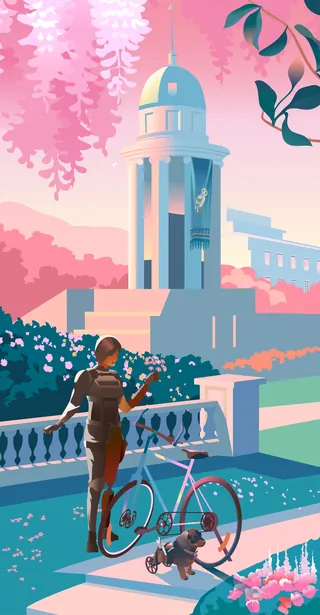Person with bicycle looking at tower surrounded by pink foliage and flowers