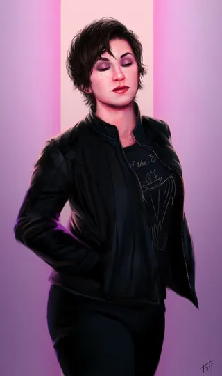 Portrait of woman with short dark hair wearing black jacket