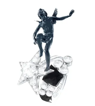 Silver winged figure on star and gem-encrusted platform
