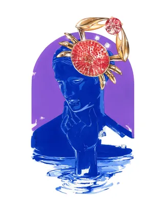 Blue sculpture of human head with golden crab and red coral decoration