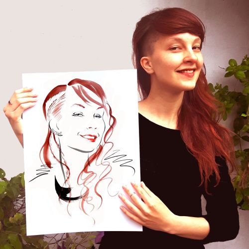 Beauty showing her drawing
