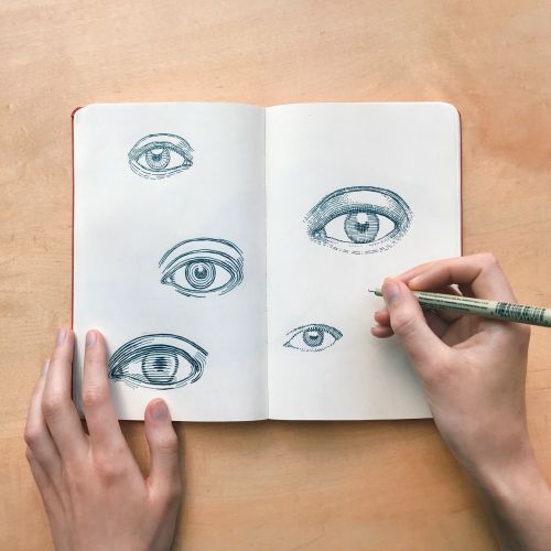 Live event drawing of different eyes by August Lamm