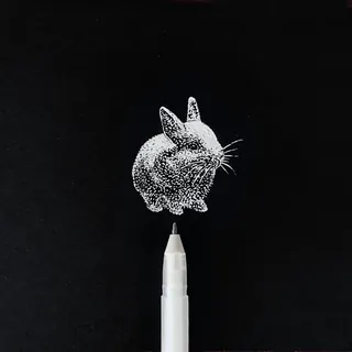 White ink drawing of a rabbit by August Lamm over a white pen on black background